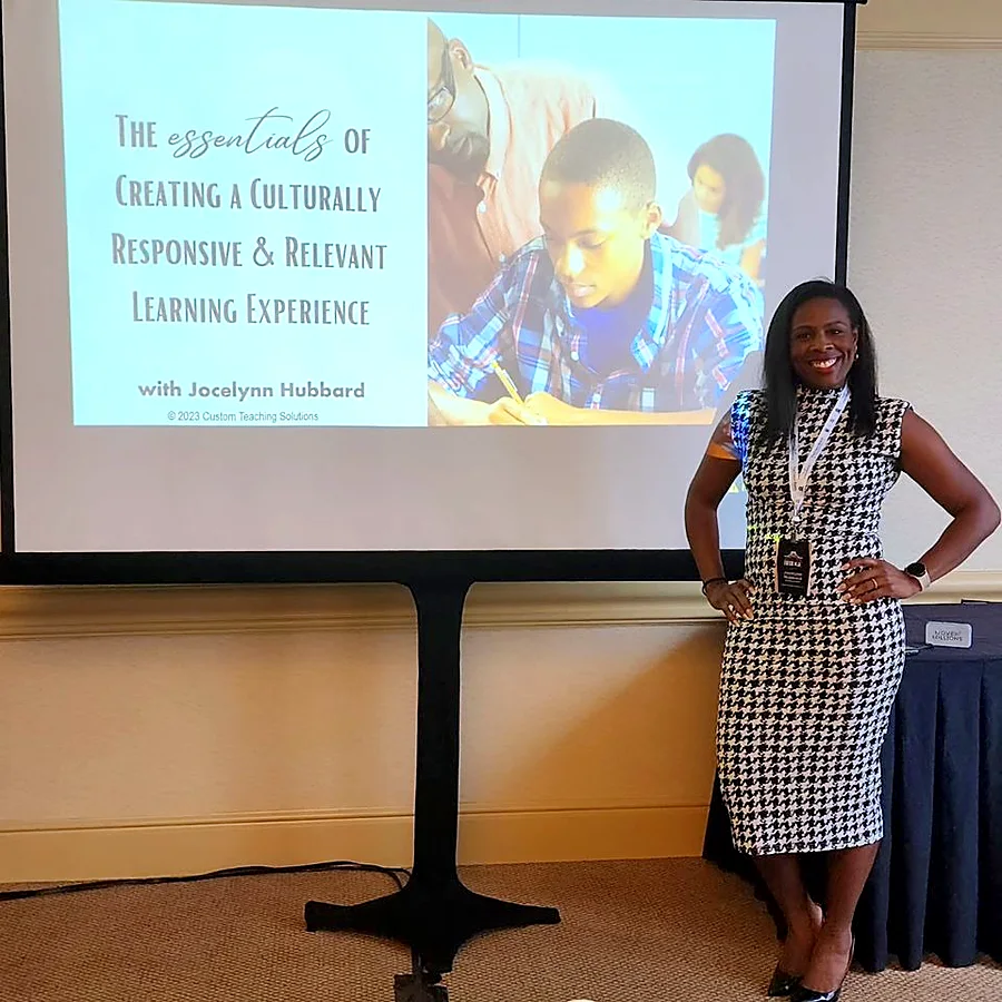 Jocelynn at a conference beside her session title slide